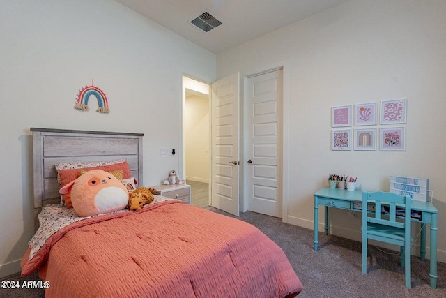 bedroom with dark carpet