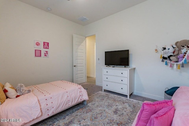 bedroom with light carpet