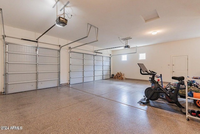 garage featuring a garage door opener