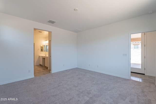 24184 W Gibson Ln, Buckeye, AZ 85326 - empty room featuring light carpet and a smoke detector