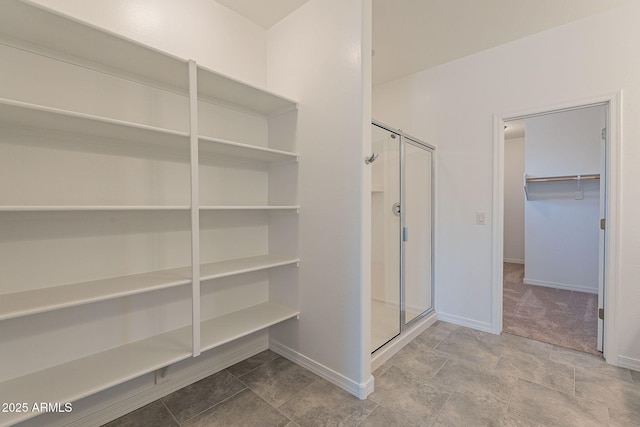 24184 W Gibson Ln, Buckeye, AZ 85326 - full bath featuring a shower stall and a walk in closet