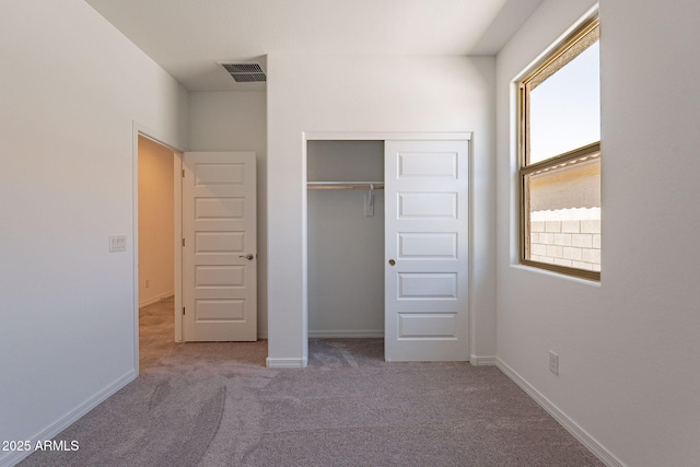 24184 W Gibson Ln, Buckeye, AZ 85326 - unfurnished bedroom with carpet and a closet