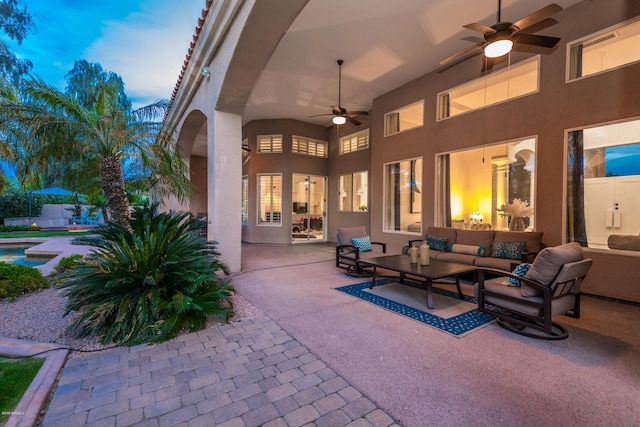 view of patio featuring a fenced in pool, an outdoor hangout area, visible vents, and a ceiling fan