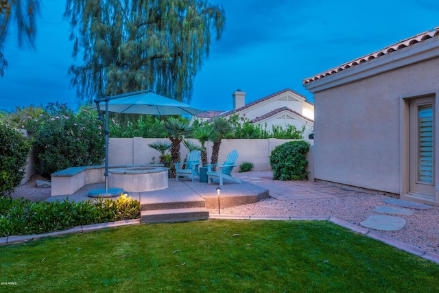 view of yard featuring a fenced backyard and a patio