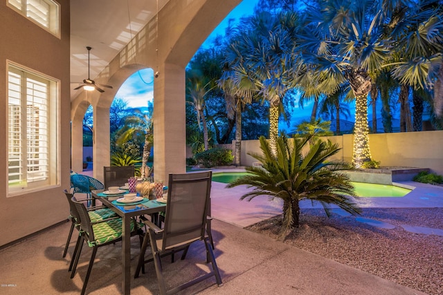 view of patio / terrace with ceiling fan, outdoor dining area, and a fenced backyard