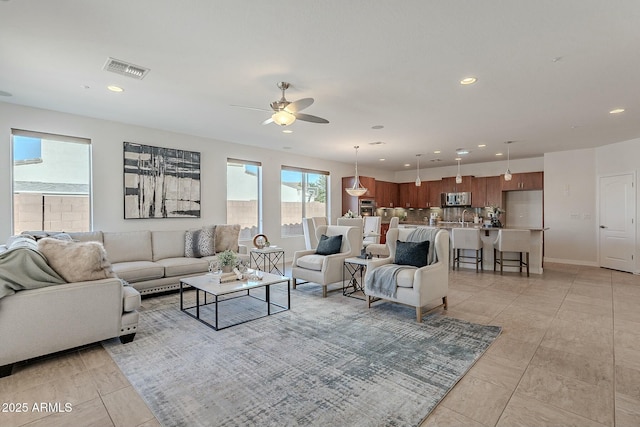 living room featuring ceiling fan