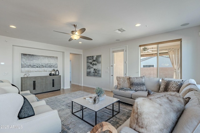 living room with ceiling fan