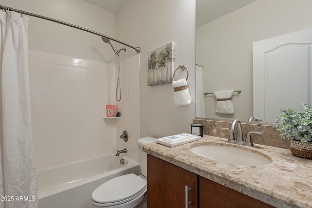 full bathroom featuring vanity, shower / bathtub combination with curtain, and toilet