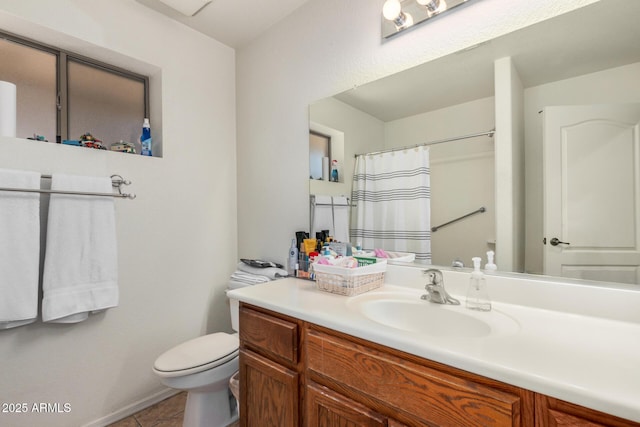 bathroom featuring vanity, a shower with shower curtain, tile patterned flooring, and toilet