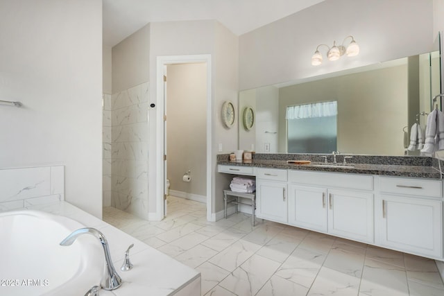 8772 W Brooklite Ln, Peoria, AZ 85383 - full bathroom with marble look tile flooring, vanity, a bath, and toilet