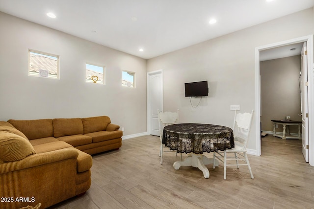 8772 W Brooklite Ln, Peoria, AZ 85383 - living room featuring light wood-style floors, baseboards, and recessed lighting