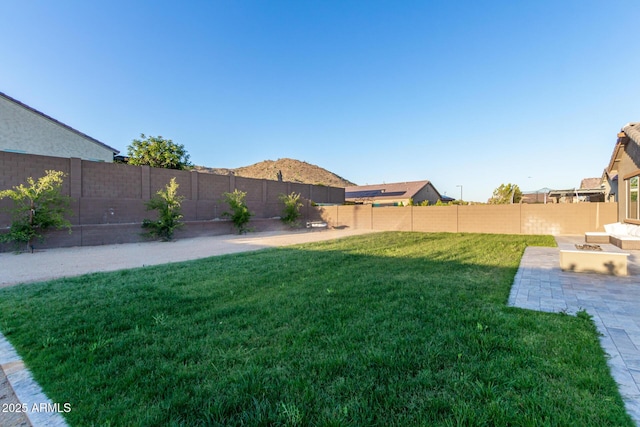 8772 W Brooklite Ln, Peoria, AZ 85383 - view of yard with a patio area