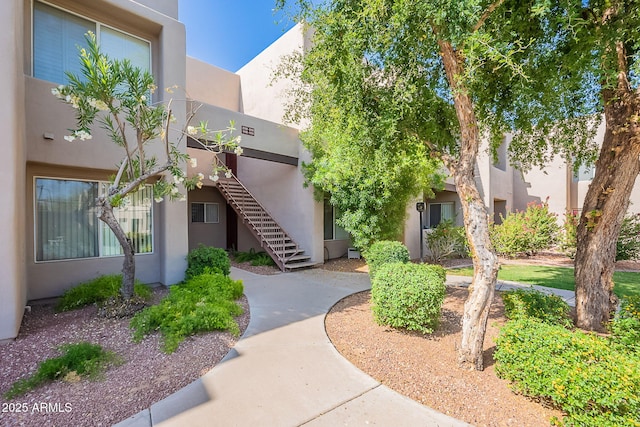 11260 N 92nd St Unit 2111, Scottsdale, AZ 85260 - view of building exterior featuring stairway