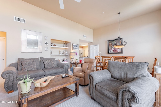 11260 N 92nd St Unit 2111, Scottsdale, AZ 85260 - living room featuring carpet flooring, a ceiling fan, and high vaulted ceiling