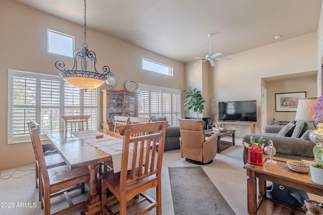 11260 N 92nd St Unit 2111, Scottsdale, AZ 85260 - dining area featuring light colored carpet, plenty of natural light, a towering ceiling, and ceiling fan