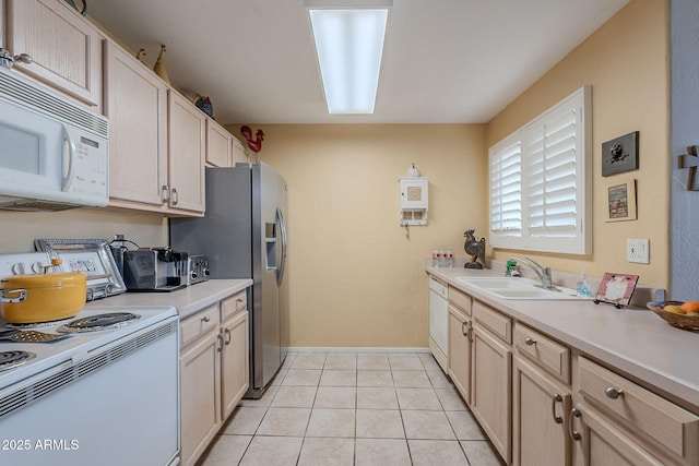 11260 N 92nd St Unit 2111, Scottsdale, AZ 85260 - kitchen with white appliances, a sink, light countertops, and light tile patterned floors