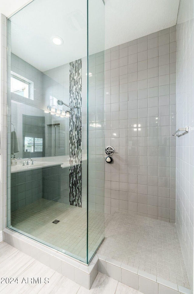 bathroom featuring tile flooring and plus walk in shower