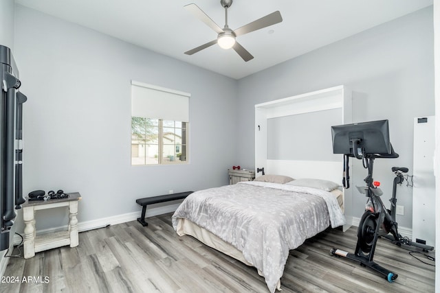 bedroom featuring ceiling fan and light wood-type flooring