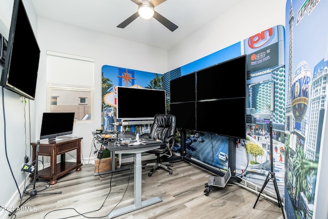 office space with ceiling fan and light hardwood / wood-style flooring