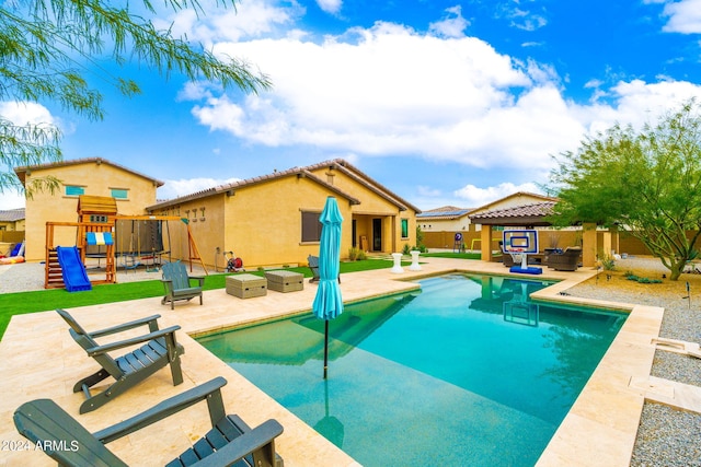 view of swimming pool featuring a gazebo, a playground, and a patio