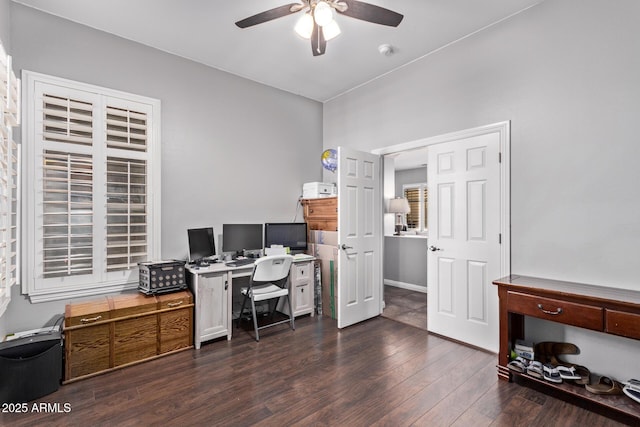 home office featuring a ceiling fan and dark wood finished floors