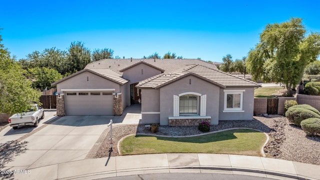 ranch-style house featuring concrete driveway, an attached garage, stucco siding, a tiled roof, and stone siding