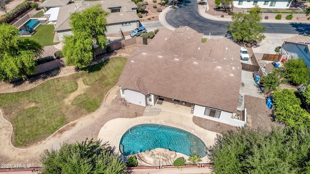 aerial view of residential area with a pool area