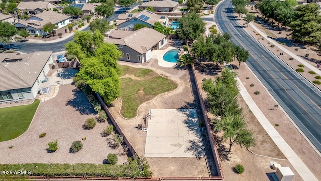 aerial view of residential area with a pool area