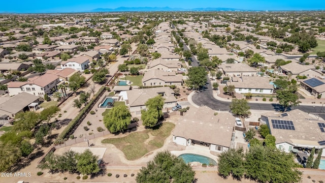 view of property location featuring nearby suburban area and mountains