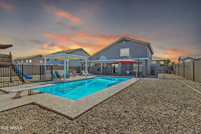 view of pool with a patio area, a fenced backyard, a fenced in pool, and a pergola