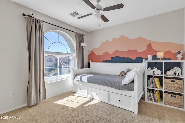 carpeted bedroom with visible vents, ceiling fan, baseboards, and multiple windows