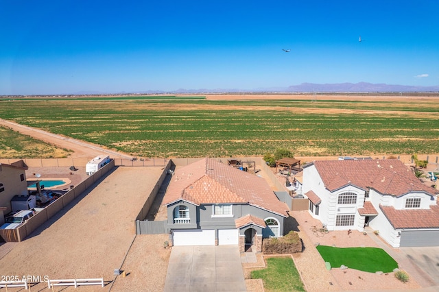 birds eye view of property featuring a rural view