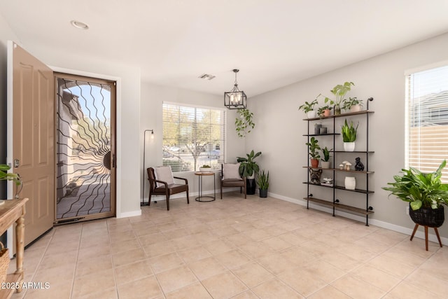 sitting room featuring a healthy amount of sunlight