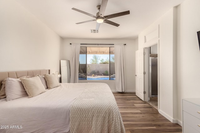 bedroom featuring ceiling fan and dark hardwood / wood-style flooring