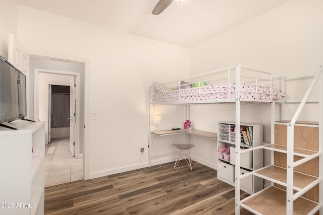 bedroom with hardwood / wood-style floors