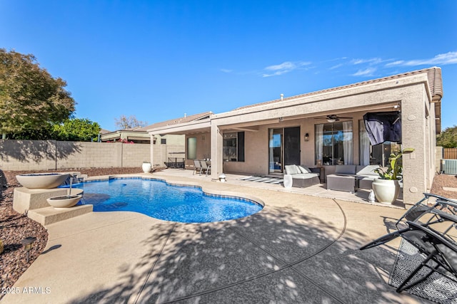 view of pool featuring ceiling fan and a patio