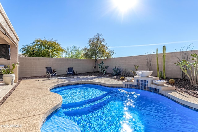 view of pool with a patio area