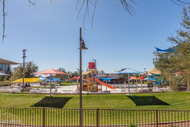 view of jungle gym with a lawn