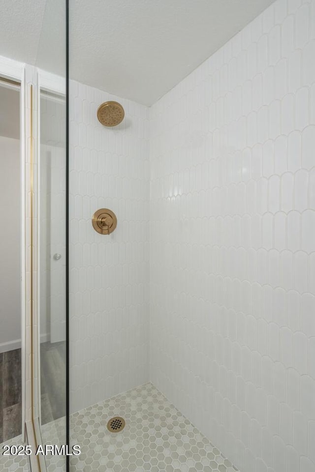 1351 N Pleasant Dr Unit 2011, Chandler, AZ 85225 - bathroom featuring a tile shower