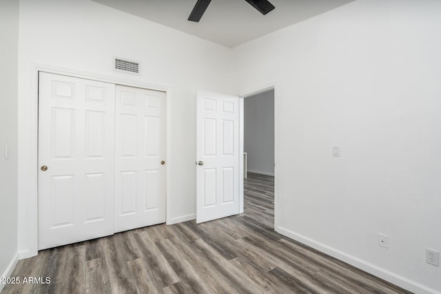 1351 N Pleasant Dr Unit 2011, Chandler, AZ 85225 - unfurnished bedroom featuring wood finished floors, a closet, and a ceiling fan