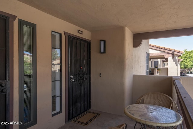 1351 N Pleasant Dr Unit 2011, Chandler, AZ 85225 - entrance to property featuring a balcony and stucco siding