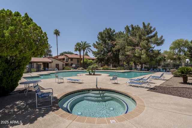 1351 N Pleasant Dr Unit 2011, Chandler, AZ 85225 - community pool with a hot tub and a patio area