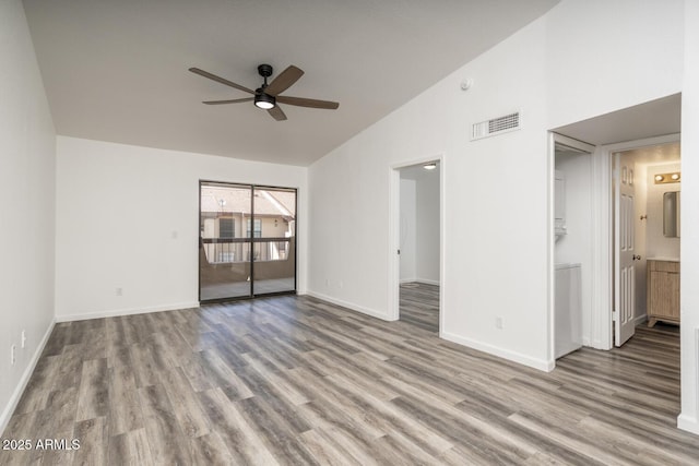1351 N Pleasant Dr Unit 2011, Chandler, AZ 85225 - unfurnished living room with ceiling fan, wood finished floors, and high vaulted ceiling