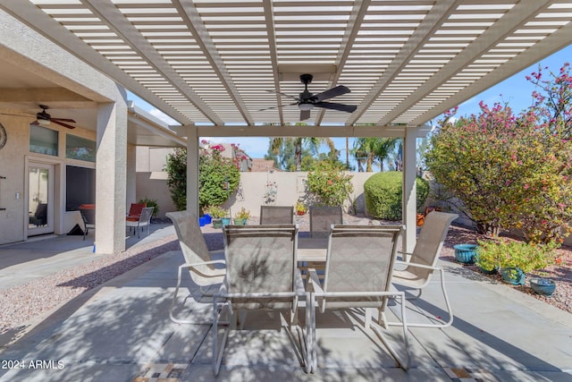 view of patio / terrace with a pergola and ceiling fan