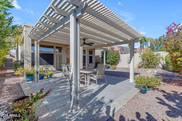 view of patio / terrace with a pergola and ceiling fan