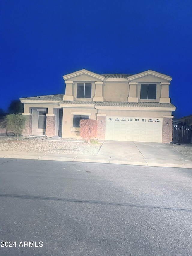 view of front of home with a garage