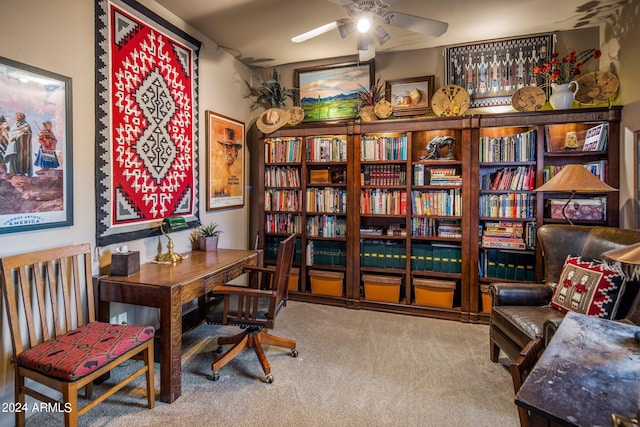 office area with carpet floors and ceiling fan