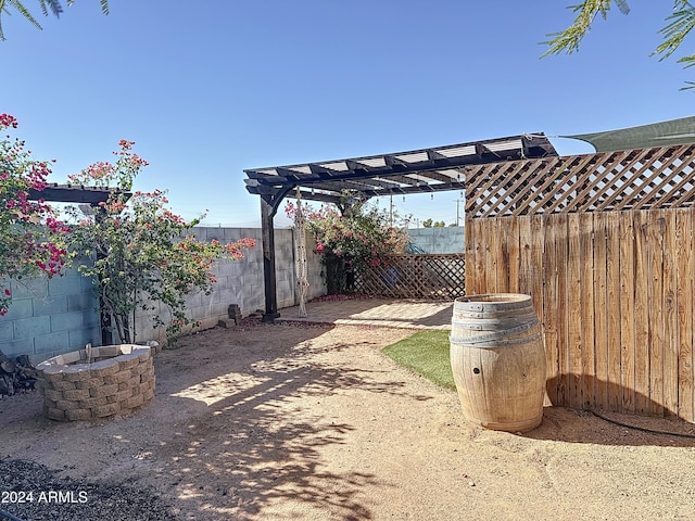 view of yard with a pergola