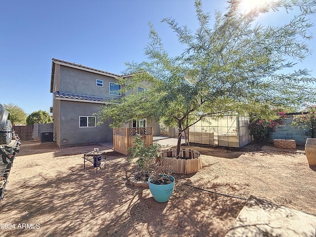 back of house featuring a patio