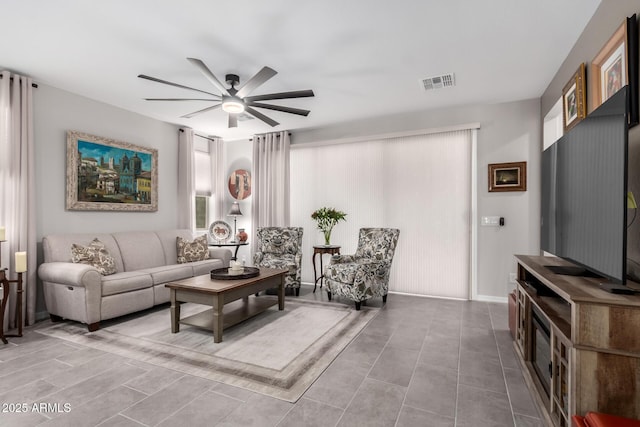 living room with ceiling fan